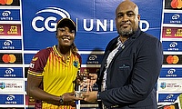 Marketing Manager Mgr of Caribcation Christopher Gustave with Player of the Match Hayley Williams