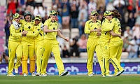 Australia's Alyssa Healy celebrates with teammates after the match