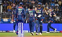 Lucknow Super Giants' Ravi Bishnoi celebrates the dismissal of Mumbai Indians' Rohit Sharma