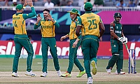 Africa's Keshav Maharaj celebrates with teammates after the dismissal of Bangladesh's Litton Das