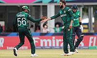 Pakistan's Imad Wasim celebrates with captain Babar Azam