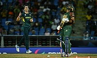 Australia's Pat Cummins celebrates the first wicket of his hat-trick against Bangladesh in the T20 World Cup