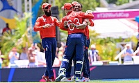England's Chris Jordan celebrates with teammates after getting a hat-trick