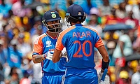 India's Virat Kohli and Axar Patel
