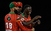 Shamar Joseph (R) and Moeen Ali (L) of Guyana Amazon Warriors celebrate