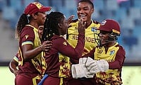 West Indies' Deandra Dottin celebrates with teammates after taking