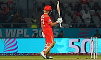 Gujarat Giants' Ashleigh Gardner celebrates his half-century