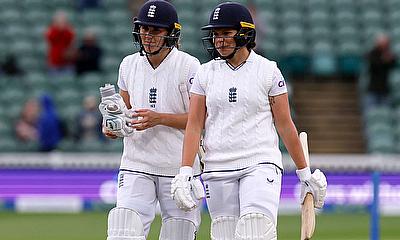 England's Alice Davidson-Richards walks off with Nat Sciver