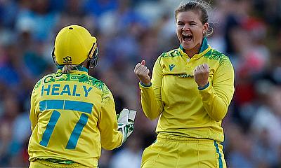 Australia's Jess Jonassen celebrates with Alyssa Healy