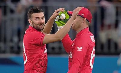 England's Mark Wood celebrates a wicket