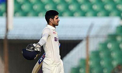 India's Shubman Gill reacts after scoring his century