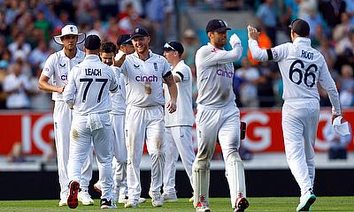 England's Ben Stokesand and Jack Leach celebrate