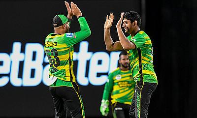 Salman Irshad (R) of Jamaica Tallawahs celebrates the dismissal of Andre Fletcher of Saint Kitts and Nevis Patriots