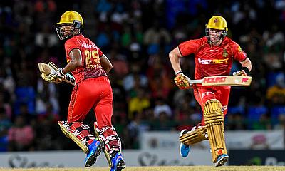 Nicholas Pooran (L) and Lorcan Tucker (R) of Trinbago Knight Riders 50 runs partnership