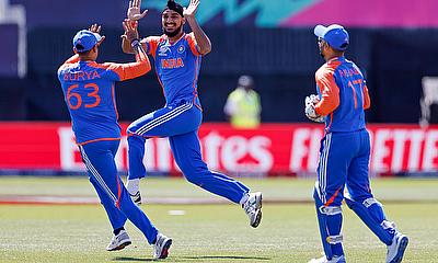 India's Arshdeep Singh celebrates after taking the wicket of Shayan Jahangir of USA