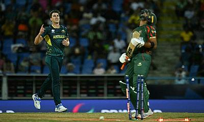 Australia's Pat Cummins celebrates the first wicket of his hat-trick against Bangladesh in the T20 World Cup