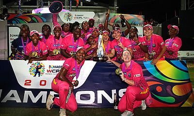 The Barbados Royals celebrate pose for a photo with the Massy Women's Caribbean Premier League trophy