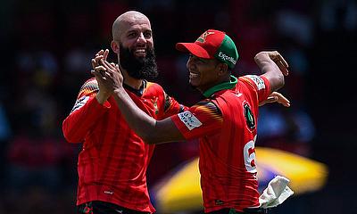 Moeen Ali (L) and Gudakesh Motie (R) of Guyana Amazon Warriors