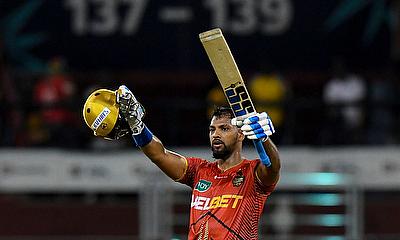 Nicholas Pooran of Trinbago Knight Riders celebrates his century