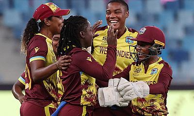 West Indies' Deandra Dottin celebrates with teammates after taking