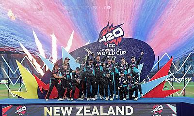 New Zealand players celebrate with the trophy after winning the Women's Cricket T20 World Cup