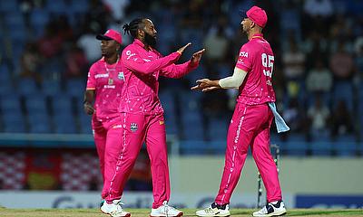 Jomel Warrican of Barbados Royals celebrates with teammate Daniel Sams Jomel Warrican of Barbados Royals celebrates with teammate Daniel Sams