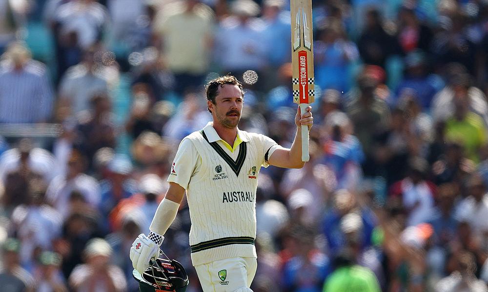 Australia's Travis Head celebrates reaching his century