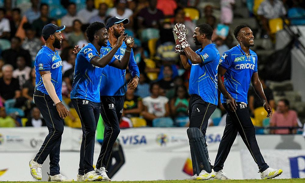 Kimani Melius (2L), Roston Chase (3L), Shadrack Descarte (L), Johnson Charles (2R) and Matthew Forde (R) of Saint Lucia Kings celebrate