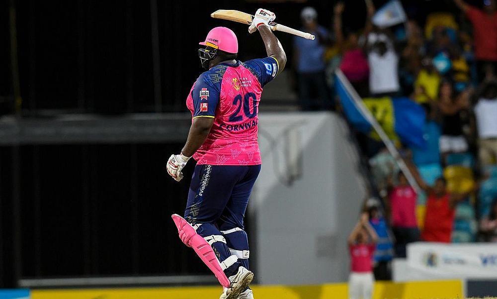 Rahkeem Cornwall of Barbados Royals celebrates his century