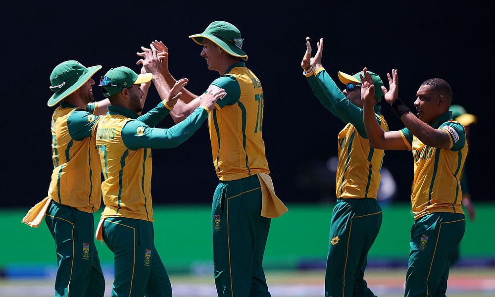 South Africa's Marco Jansen celebrates with teammates