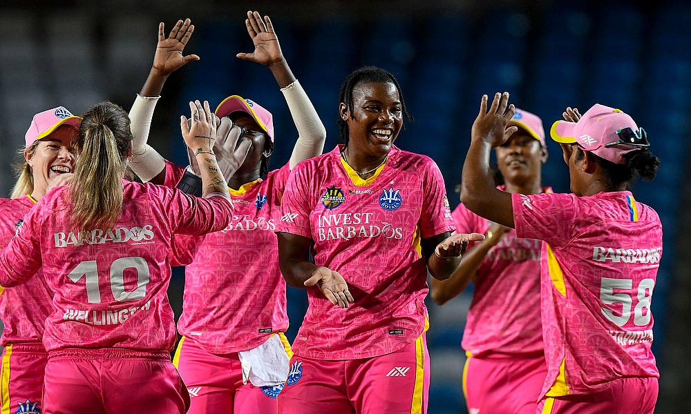 Chinelle Henry (R) of Barbados Royals celebrates with teammates