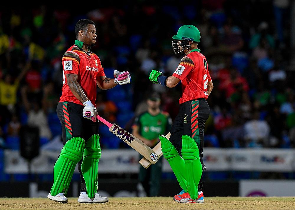 Shimron Hetmyer (L) and Rahmanullah Gurbaz (R) of Guyana Amazon Warriors 100 runs partnership