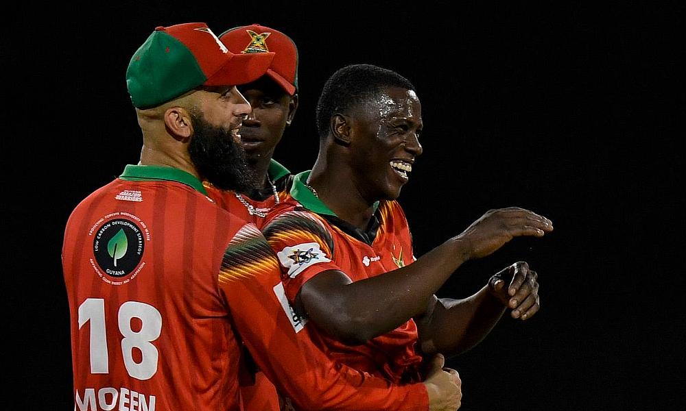 Shamar Joseph (R) and Moeen Ali (L) of Guyana Amazon Warriors celebrate