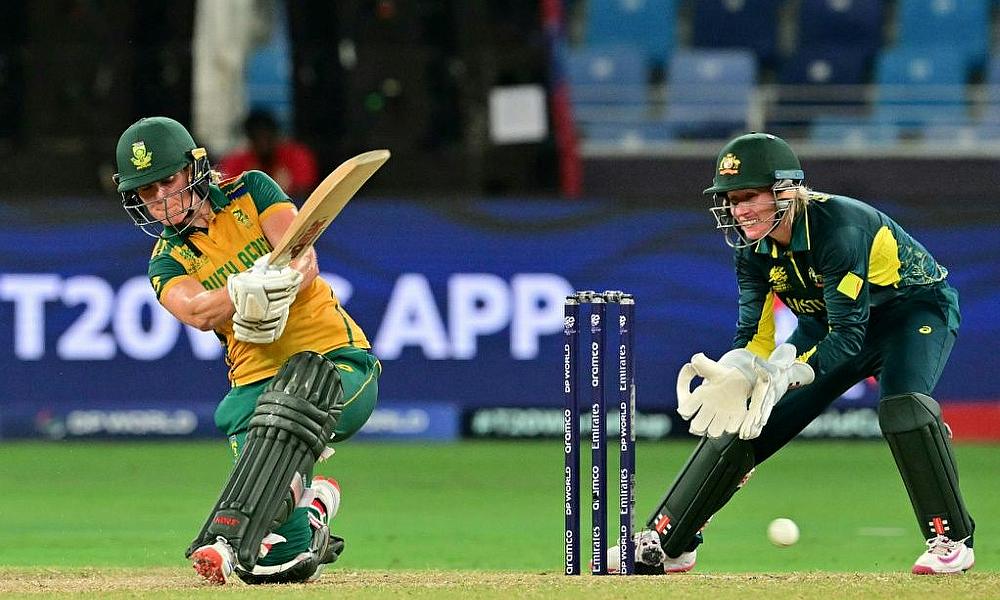 Anneke Bosch (L) on the slog sweep during her career best 74 not out against Australia